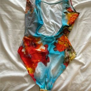 Jean Paul guitar bathing suit